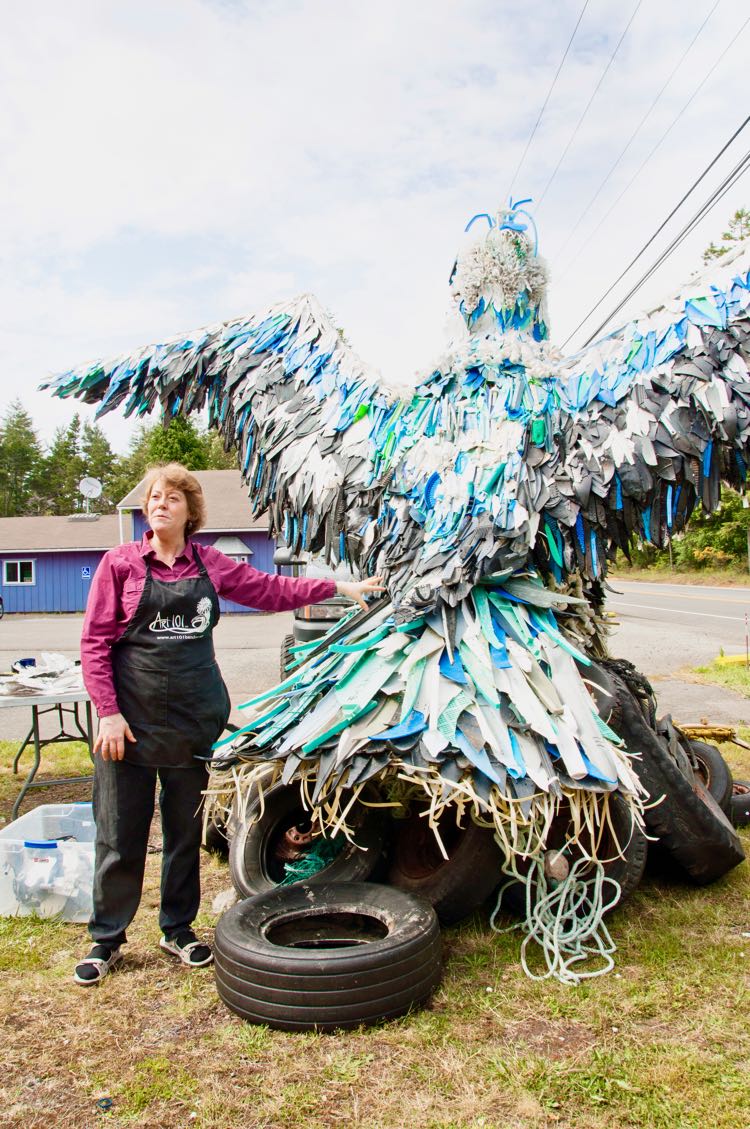 Angela Pozzi and her eagle made from ocean trash