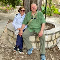 Linda and Roy sitting under tree