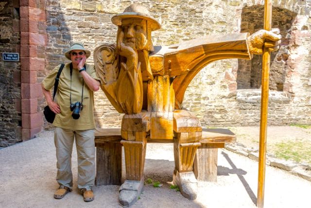 Roy Stevenson poses with sculpture at Conwy Castle in Wales