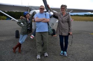 Standing with 2 other travel writers in the Yukon