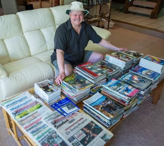 Travel magazine lists are needed to get your travel stories published. Here's my photo with many mags where I've been published.